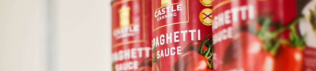 A picture of three Spaghetti Sauce cans from Castle Canning, representing Big Orange Pantry