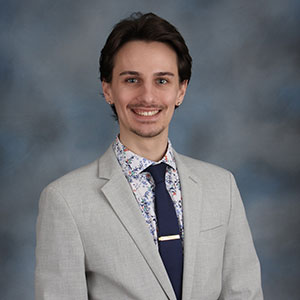 A headshot of Domenic Mularo, who serves on staff as the MCG Coordinator for the Office of Sorority and Fraternity Life.