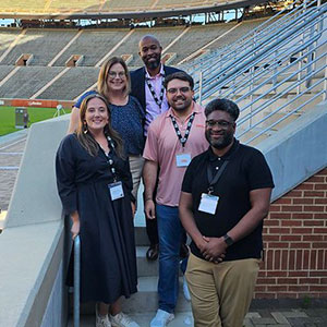 The Office of Sorority & Fraternity Life staff together for a group picture in Neyland Stadium.