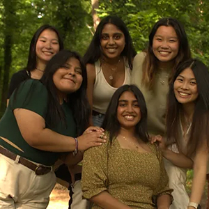 Six members of Delta Phi Lambda Sorority, Inc., posing for a group picture.