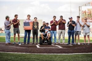 Kappa Alpha Members during a philanthropy event on baseball field. 