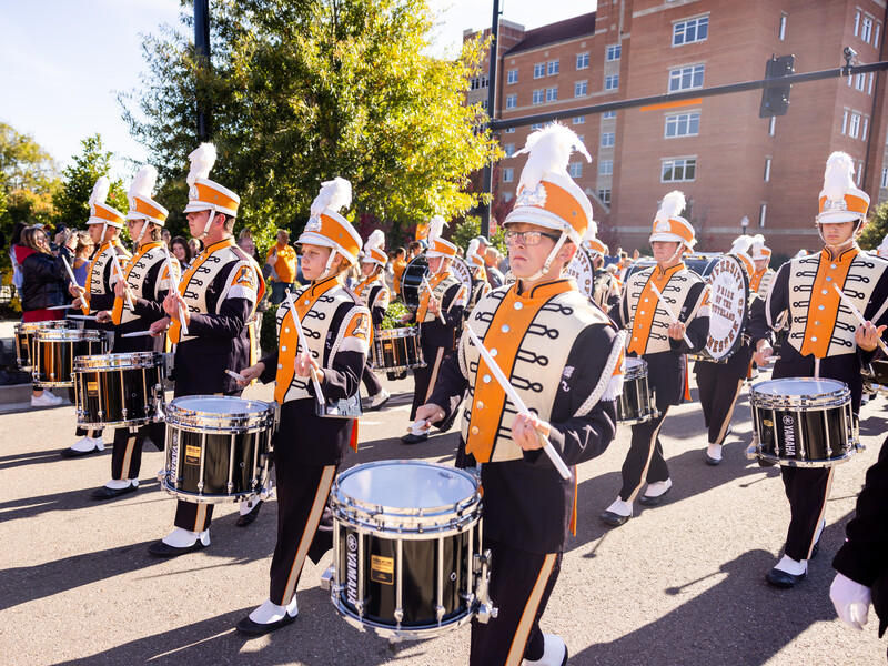 Pride of the Southland Band drum-line performs during the Homecoming Parade