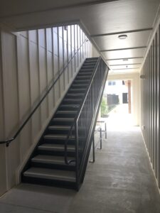 Exterior stairs leading up to the next floor of Lakemoor Station