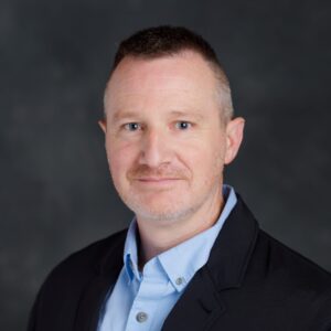 Headshot of Justin Hayes