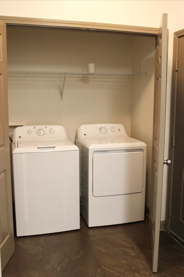 A washer and dryer in a closet in Vol Hall