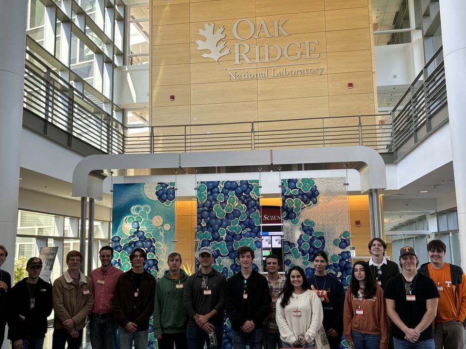 Students involved in Engage LLC 2025 take photo during ORNL Tour