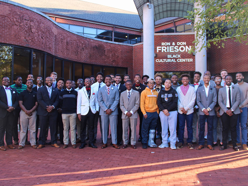 Students of BUE posed outside Frieson Black Cultural Center