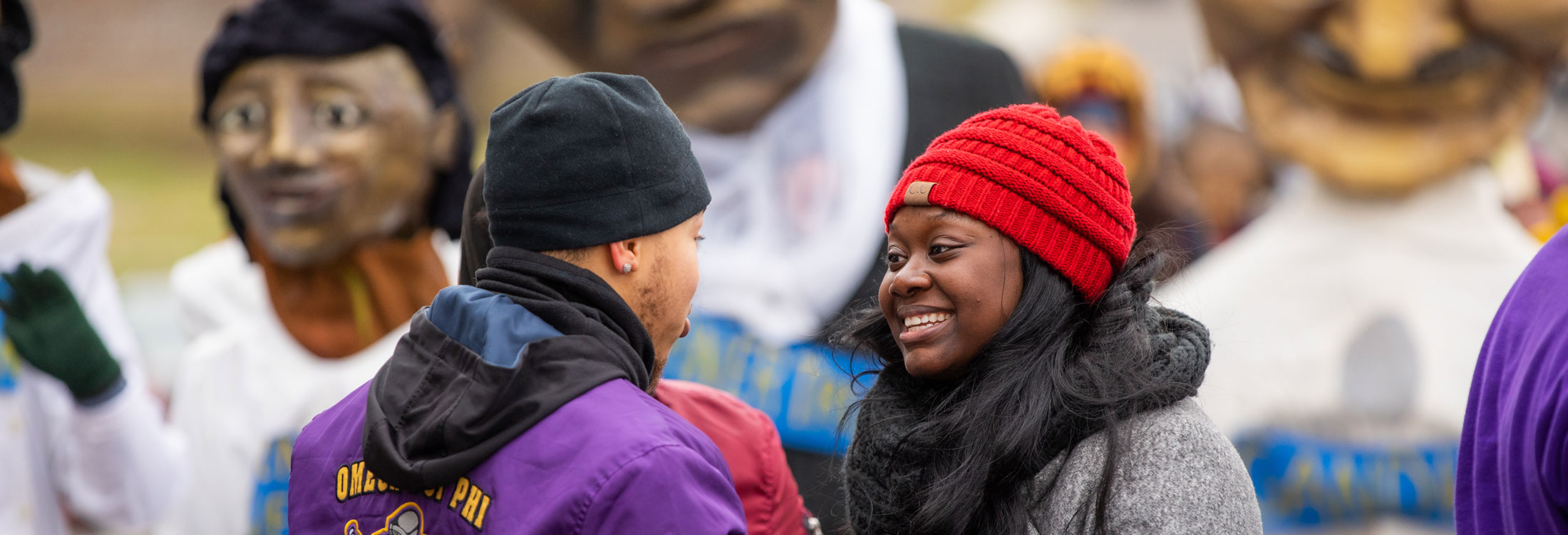Students greet each other at the MLK Jr. Day Parade