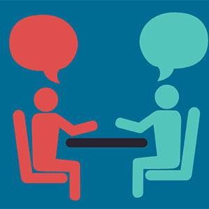 Icon of two illustrated people conversing