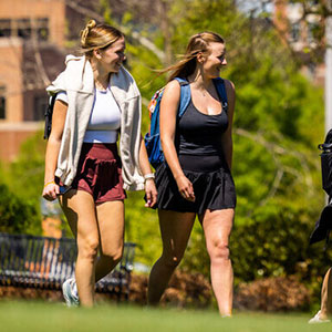 Students talk while walking across Circle Park on April 12, 2023. Photo by Steven Bridges/Steven Bridges/University of Tennessee.