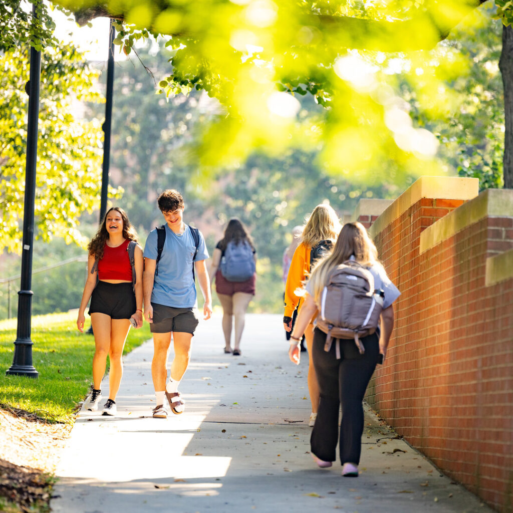 Students walk across the Hill during the first day of Fall classes on August 23, 2023. Photo by Steven Bridges/University of Tennessee.