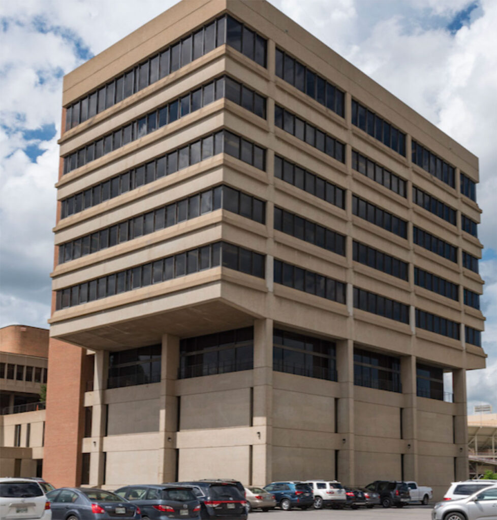 exterior photo of Andy Holt Tower on a sunny and cloudy day