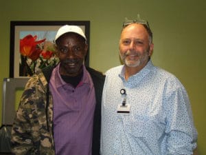 Ray Harris with Harold Murray, an east area custodial coordinator.
