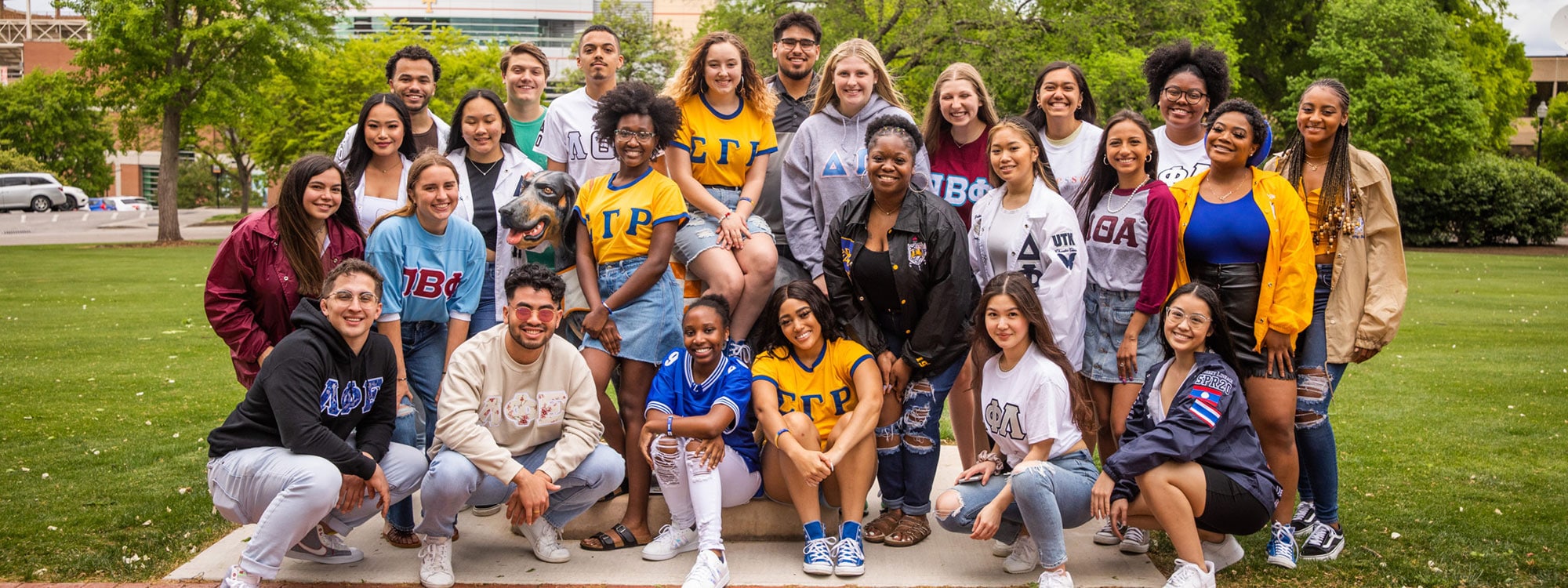 Fraternity and Sorority students posing together