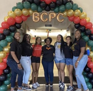 Members of BCPC under a balloon arch