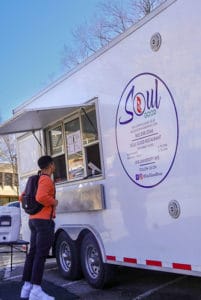 Student getting food at the Soul Good food truck