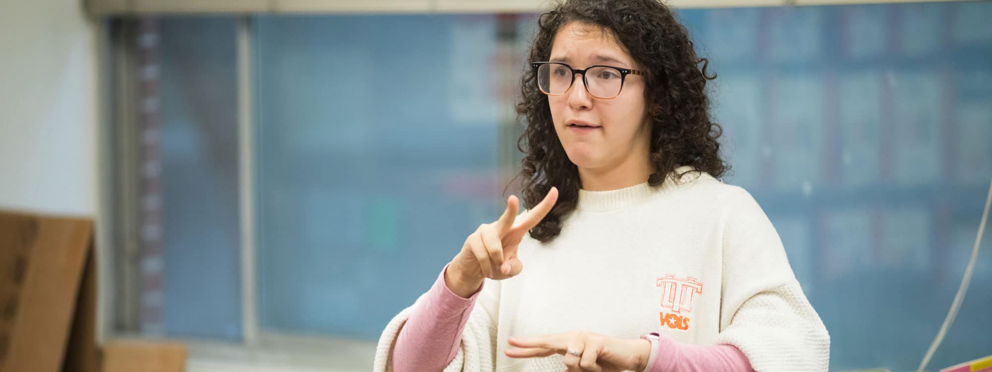 Lexi Wilkinson, a student signing in a Deaf Education class
