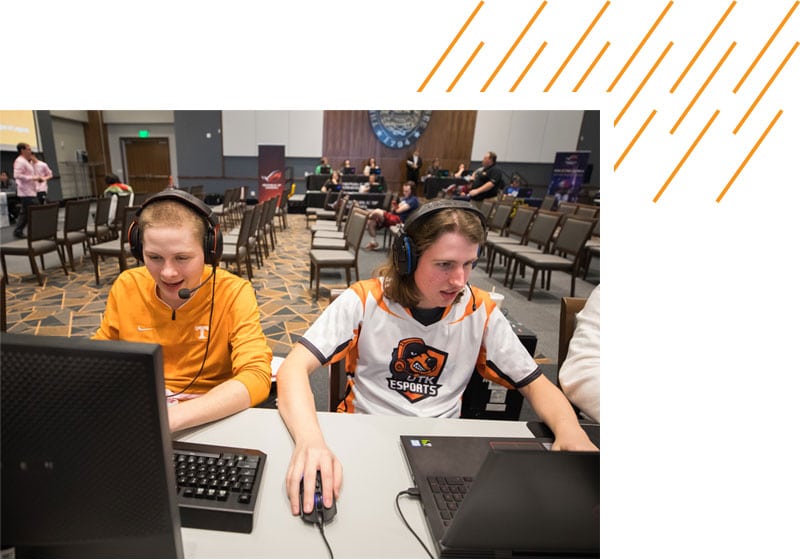 Students on computers, competing in an eSports competition
