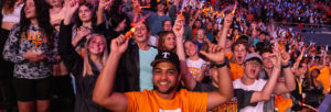 A crowd of students cheers in Thompson Boling Arena during Rocky Top Rally