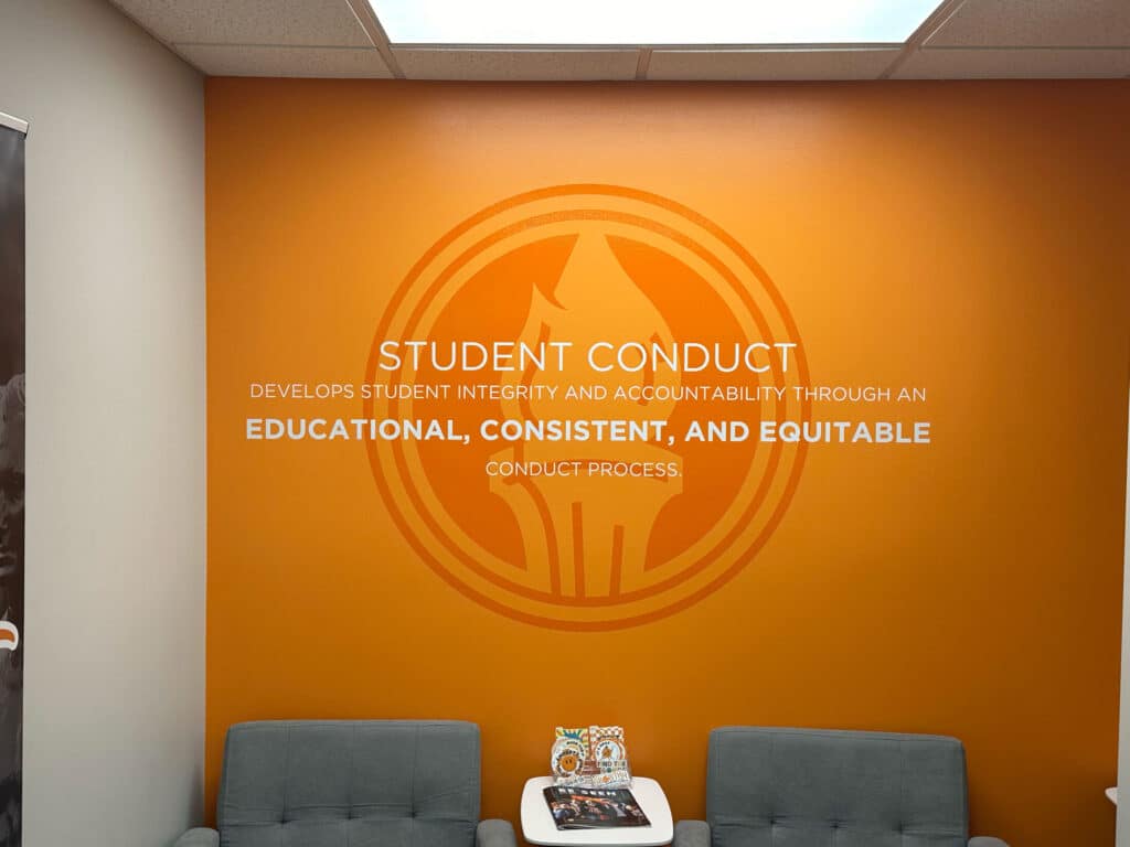 Picture of graphic in the Student Contact Building that reads "STUDENT CONDUCT develops student integrity and accountability through an educational, consistent, and equitable conduct process"