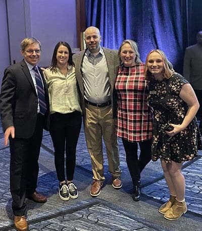picture of 5 individuals at Student Union's Student Employment Program Recognized with NASPA Excellence Award. Two males and 3 females.