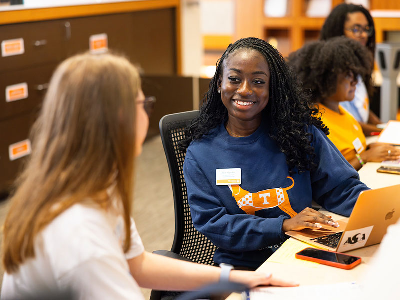 Students enjoy each other's company in a residence hall.