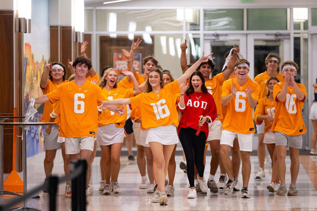 Students walk down the hall.