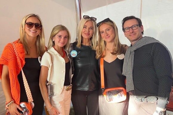 The Epstein family standing for a photo.